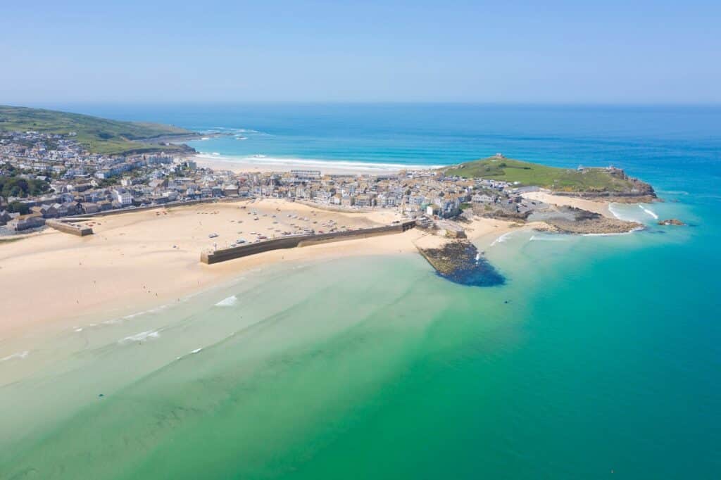 An aerial view of the beach and harbour at St Ives in Cornwall