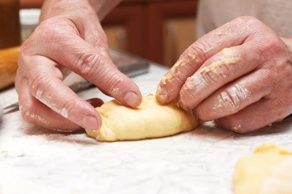 Baker making a pasty