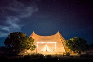Big tent illuminated a night