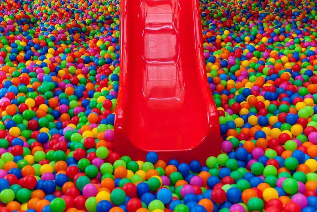 A slide going into a ball pit